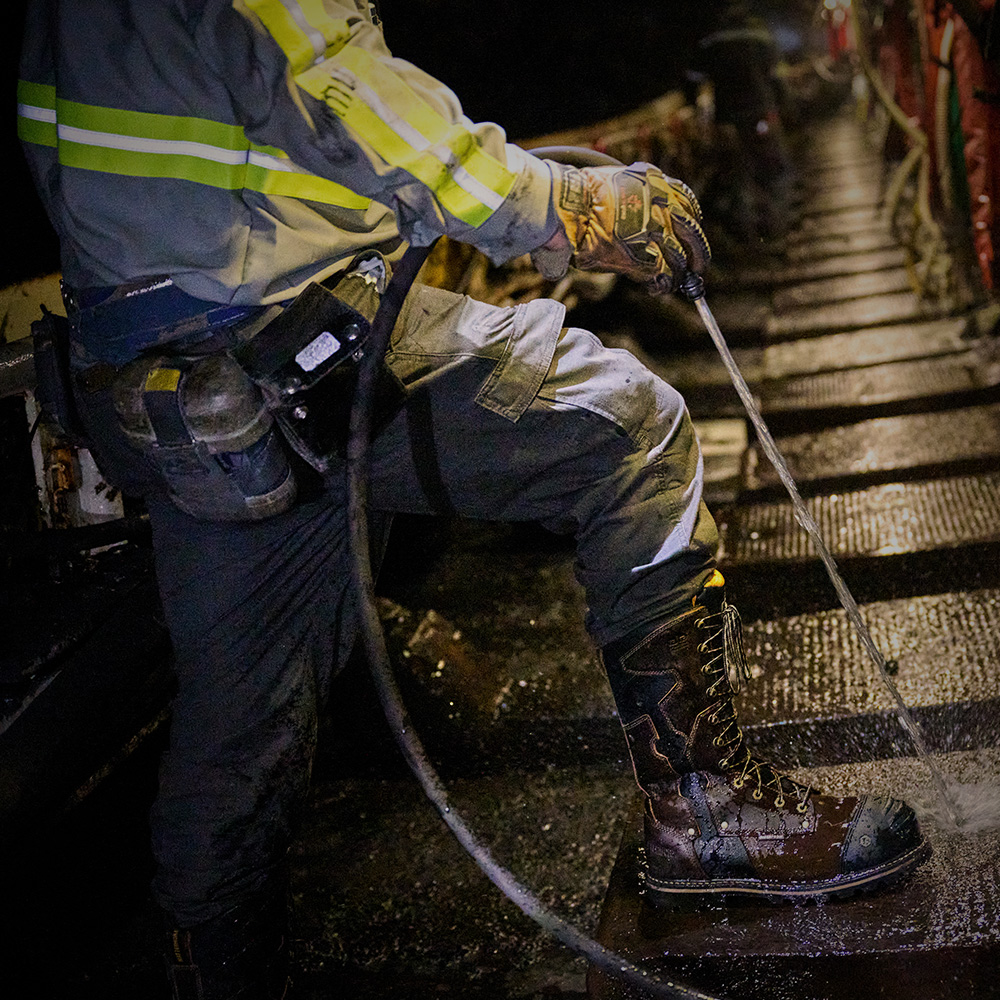 A man wearing Matterhorn boots and working in a mine.